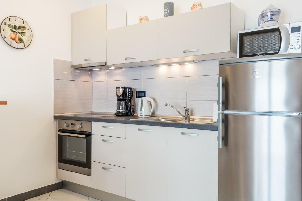 Apartmani Hrvatin โอปาติยา ภายนอก รูปภาพ